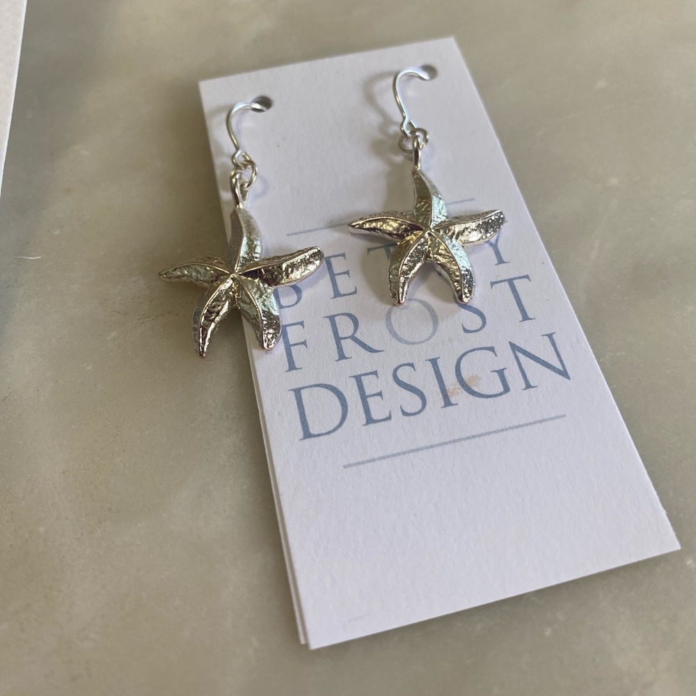 NEW $60 Betsy Frost medium Silver Starfish Dangle Earrings